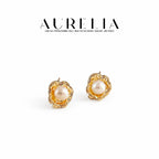 Fluid Frame Freshwater Pearl Stud Earrings — product view