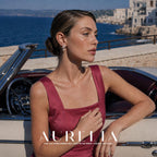 Clustered Crystal Pearl Stud Earrings worn by a model