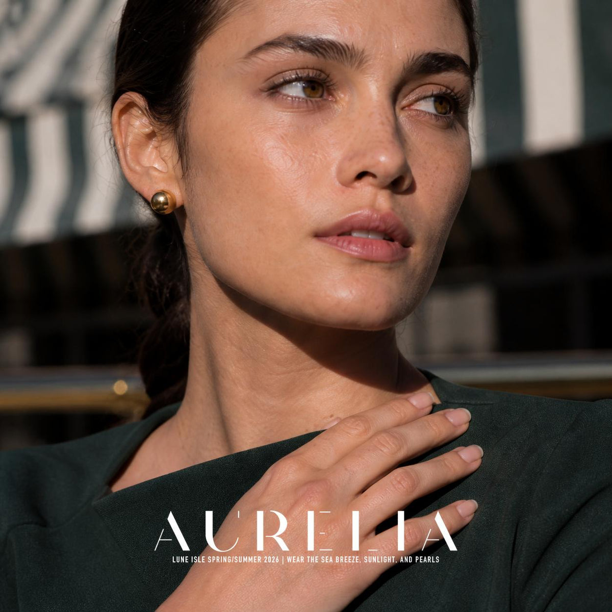 Mocha Crystal Pearl Stud Earrings worn by a model