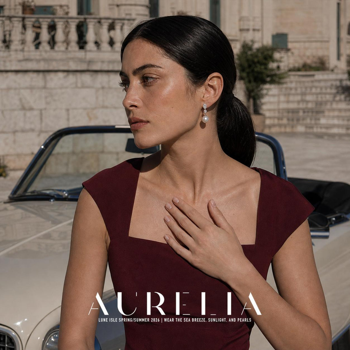 Round Shell Pearl Drop Earrings worn by a model