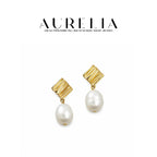 Wave Baroque Freshwater Pearl Earrings — main image from supplied product materials.