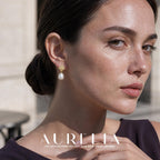 Close face and ear view. Textured folded gold-colored square/rectangular top with one oval white drop and a small joining ring; the same two-part structure appears in all worn views.
