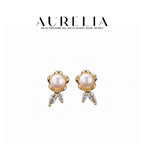 Floral Freshwater Pearl Stud Earrings — main image from supplied product materials.
