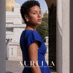 Over-shoulder model portrait wearing a rounded gold-tone and white swirl stud with round center bead.