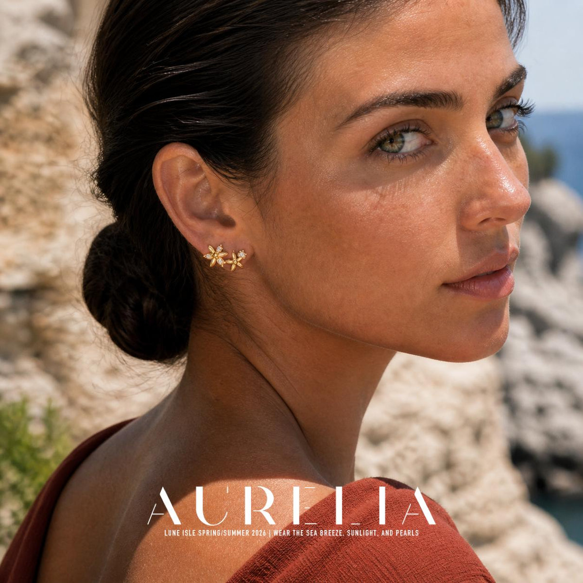 Over-shoulder outdoor portrait with the floral cluster clearly visible on the ear.