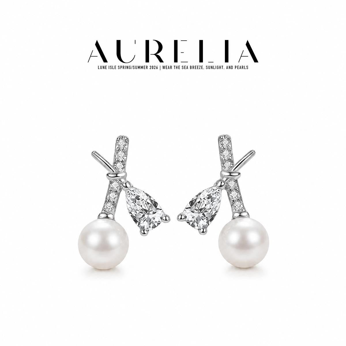 Silver-tone standalone crossed-bar pair with separate pear-shaped clear accents and white round beads.