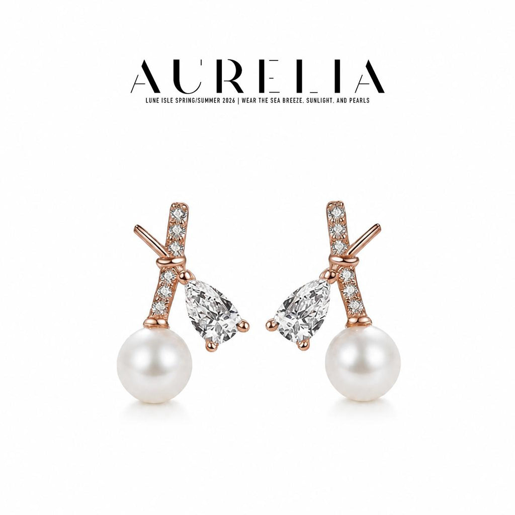 Crossed Bar Pearl Stud Earrings — supplied AURELIA product photograph.