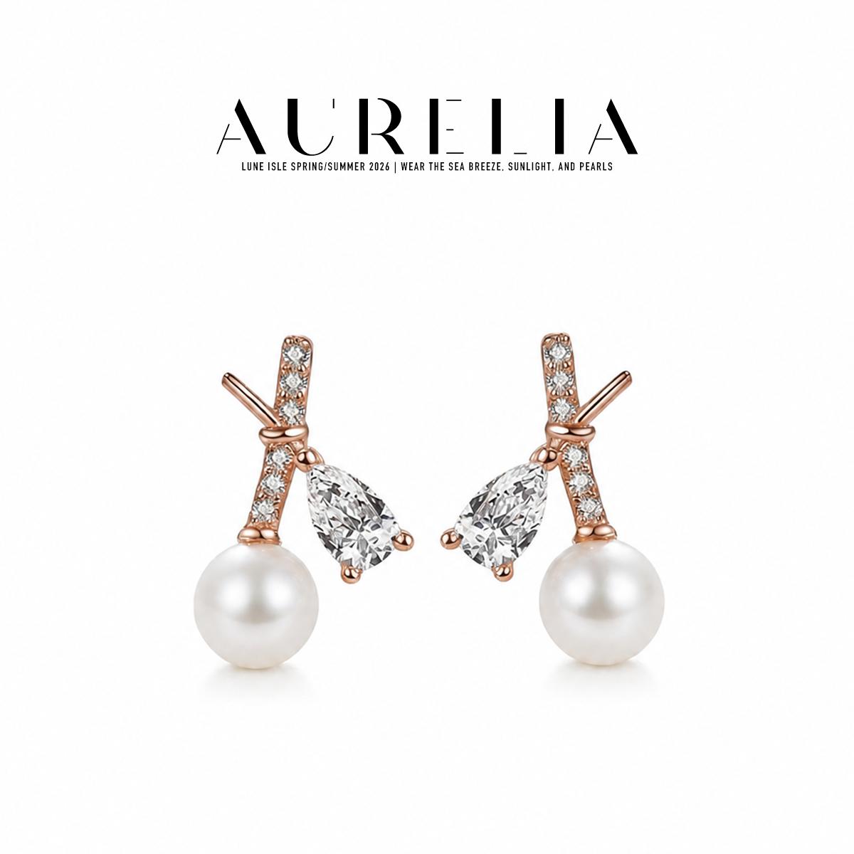 Crossed Bar Pearl Stud Earrings — supplied AURELIA product photograph.