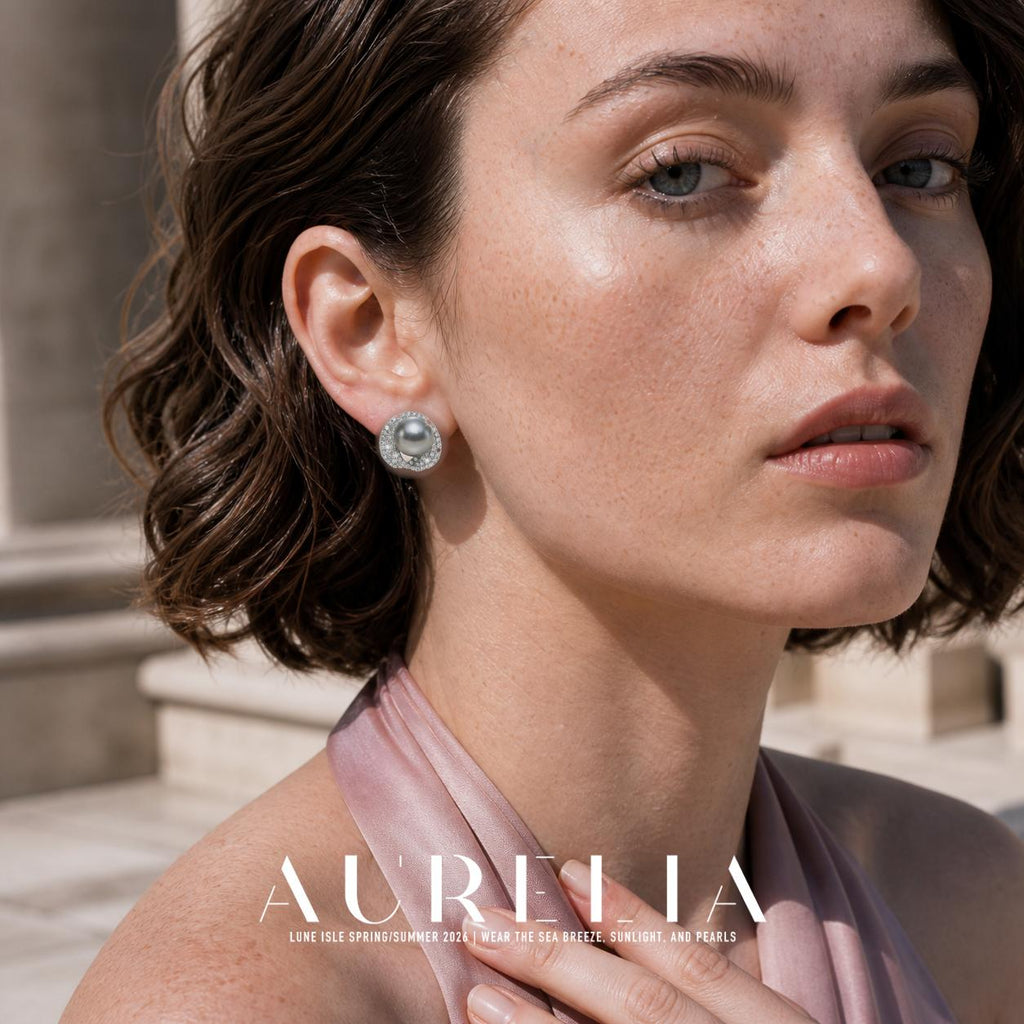 Front close portrait wearing gray-center silver-tone stud with overlapping accent loops.