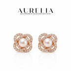 Floral Pearl-Accent Stud Earrings — supplied AURELIA product photograph.