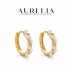 Twisted Shell Pearl Hoop Earrings — supplied AURELIA product photograph.