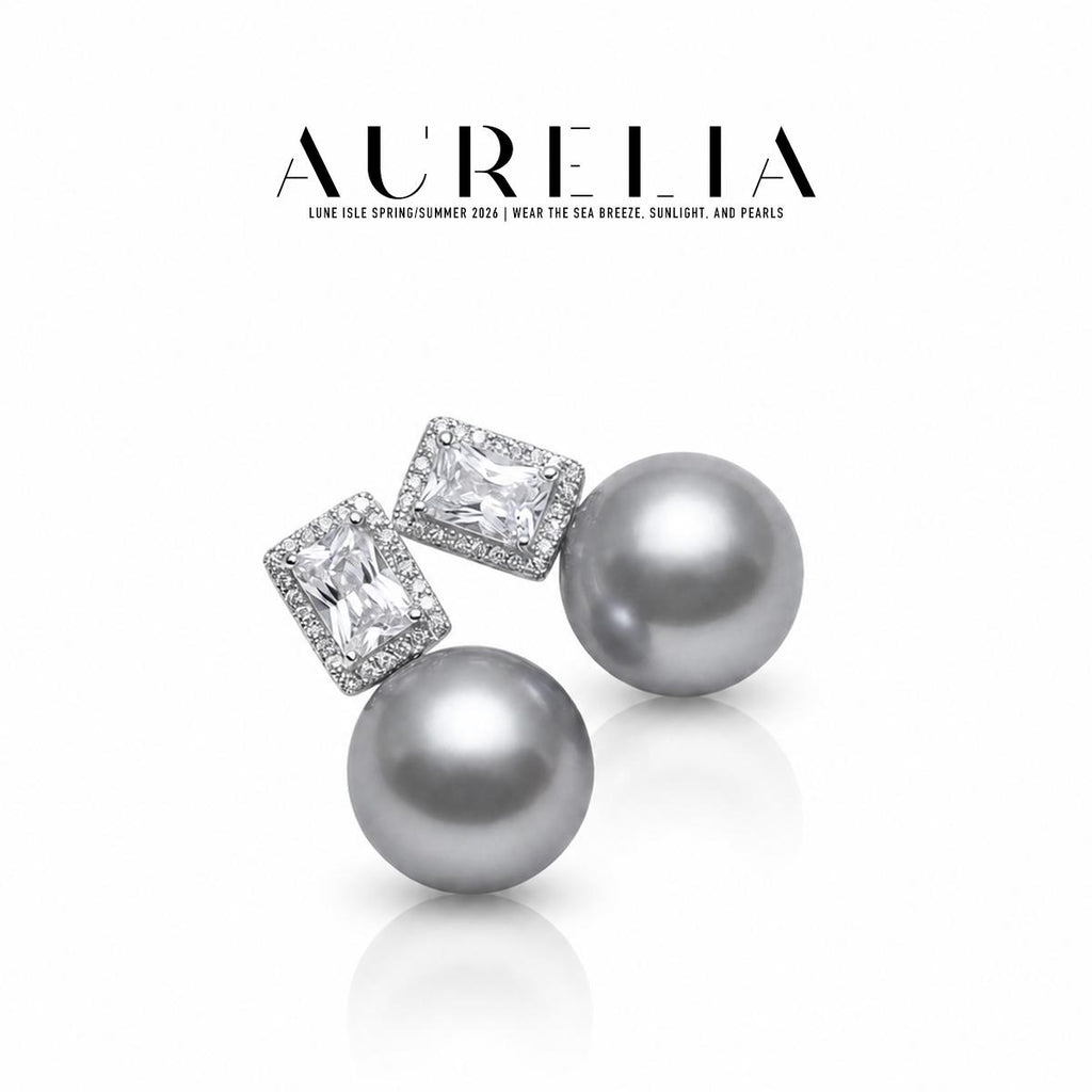 Standalone gray-bead pair with rectangular clear centers and matching small-stone halos.