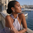 Leaning marina portrait reveals the same elongated open twist and round bead.