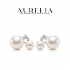 Triangle Shell Pearl Stud Earrings — supplied AURELIA product photograph.