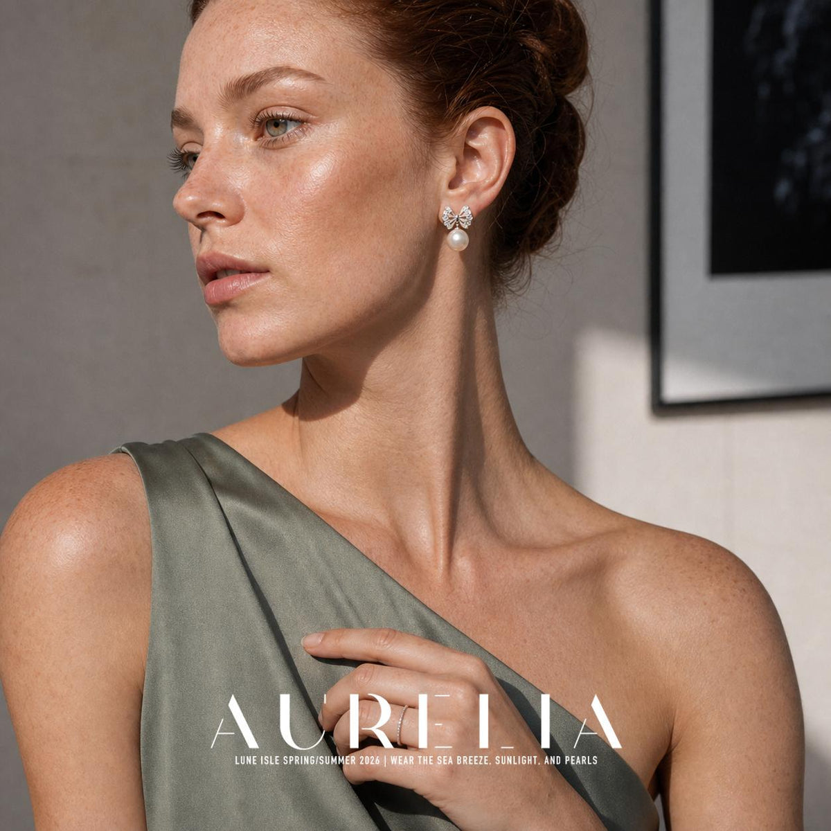 Chest-up portrait in green with hand at neckline clearly shows the scalloped pointed butterfly-wing top and white bead.