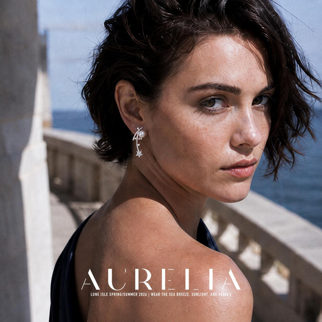 Over-shoulder waterfront portrait showing the same shooting-star earring from another direction.