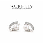 Curved Glass Pearl Stud Earrings — supplied AURELIA product photograph.