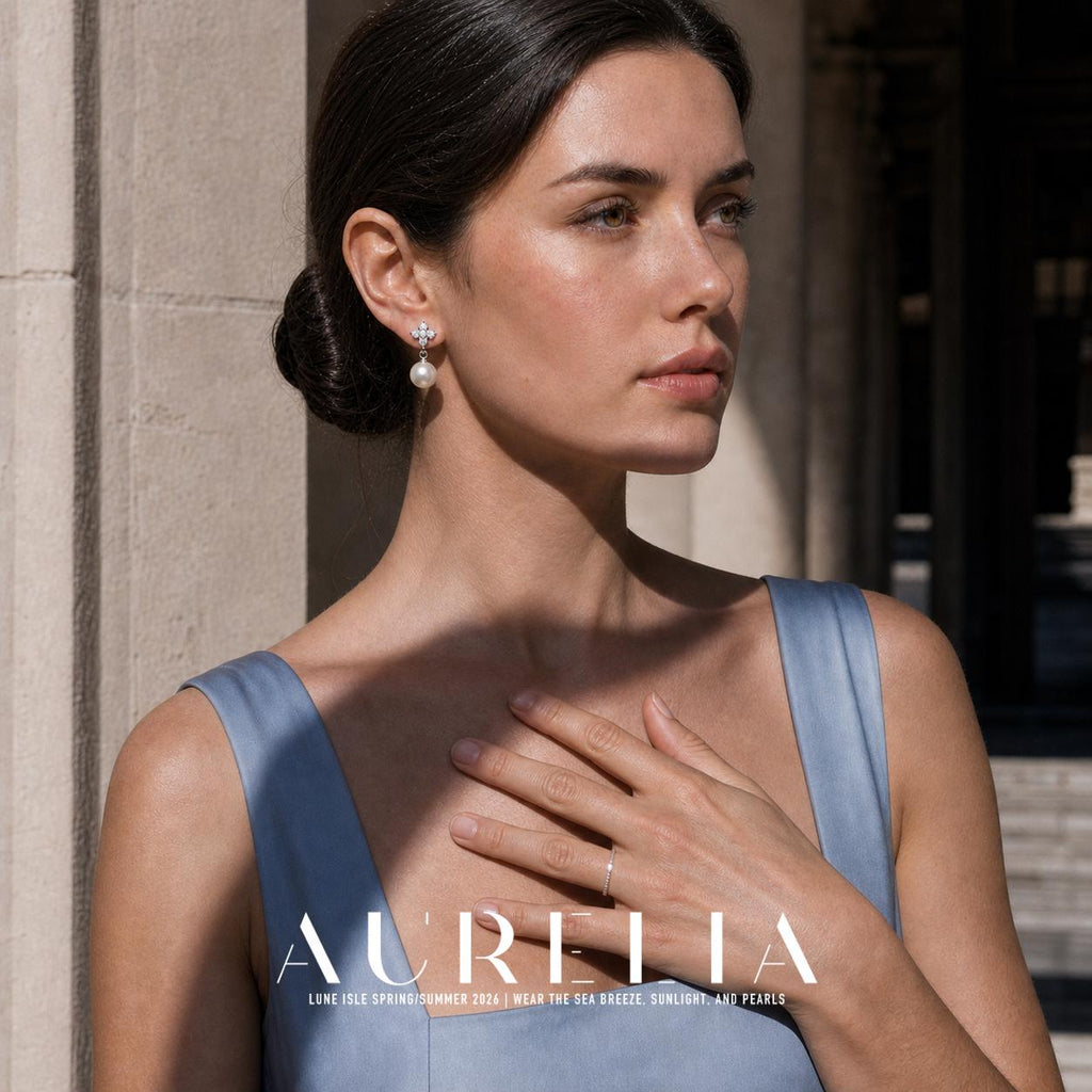 Model in a pale blue dress at a stone doorway, showing the same flower-and-drop earring.