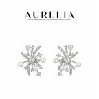 Standalone pair in silver color with clear square centers, curved rays, four white beads and smaller clear accent tips.