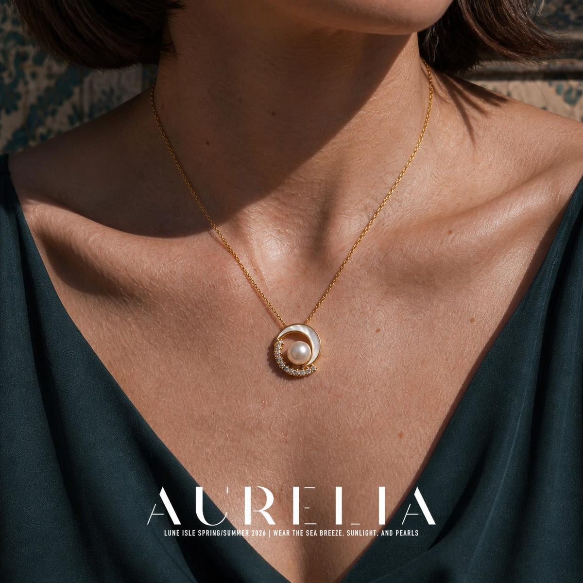Close neckline view showing the crescent, curved stone row and central white bead.