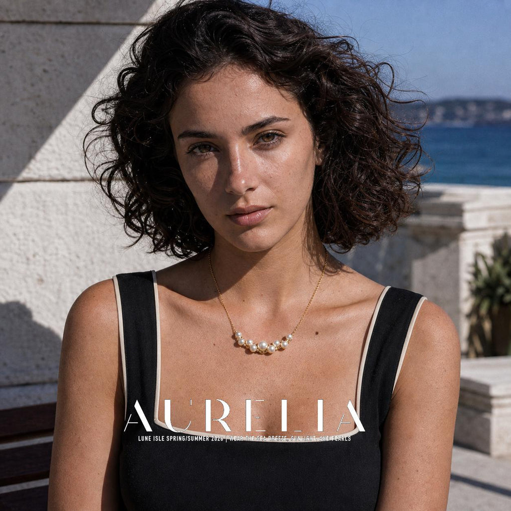 Closer front portrait wearing the matching curved nine-bead cluster necklace.