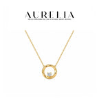 Twisted Circle Pendant Necklace — supplied AURELIA product photograph.