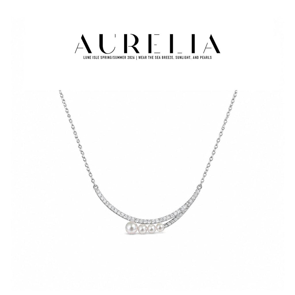 Standalone silver-colored necklace with two clear-accent curved bars and four graduated white beads.