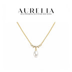 Wave Freshwater Pearl Drop Necklace — supplied AURELIA product photograph.