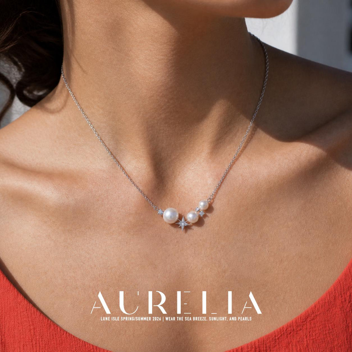 Close neckline view showing the three white beads and pointed center star.