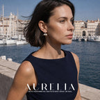 Model at marina wearing silver-tone hoops with paired white beads.