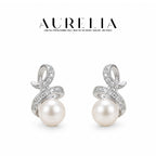 Swirl Freshwater Pearl Earrings — supplied AURELIA product photograph.