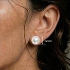 Close ear image showing the matching white round stud with only a 12mm measurement label.