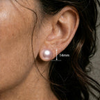 Close ear image showing the matching pink round stud with only a 14mm measurement label.