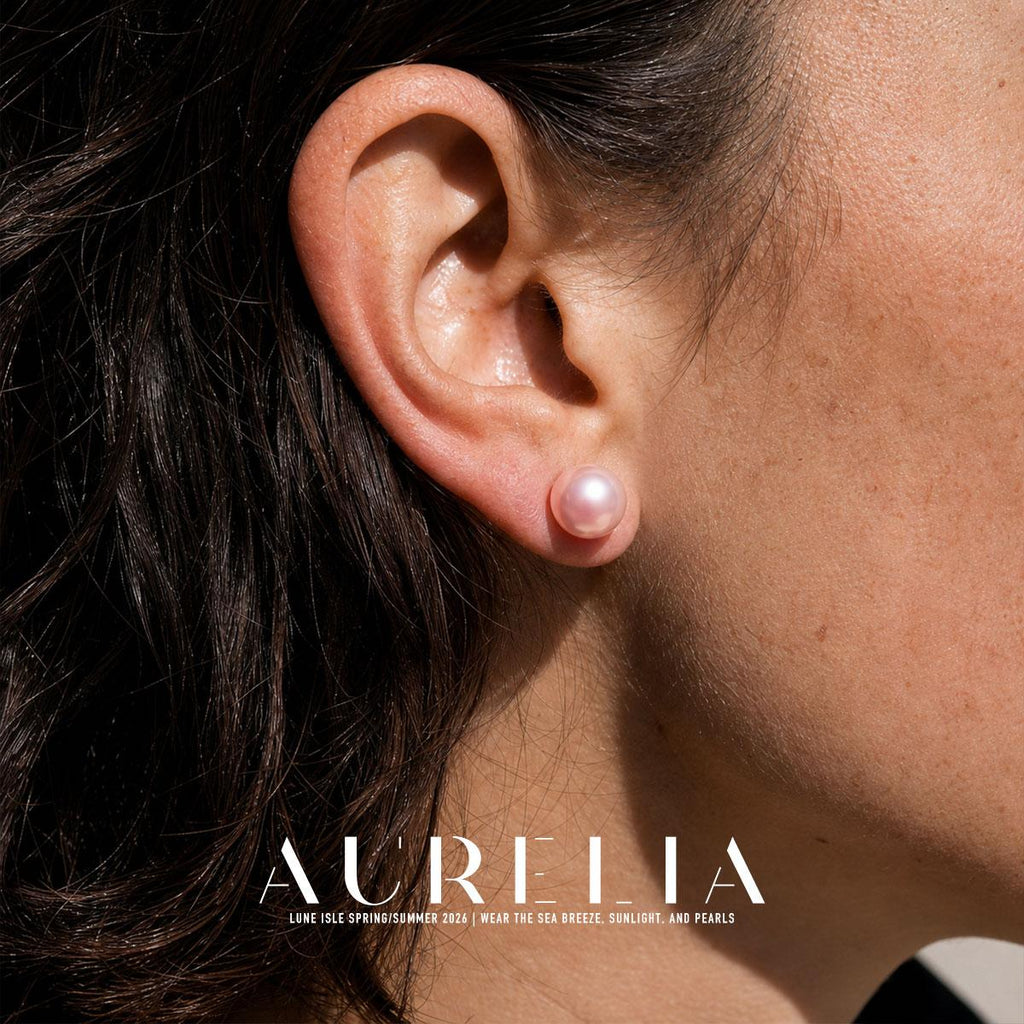 Ear close-up of a simple pink round stud.
