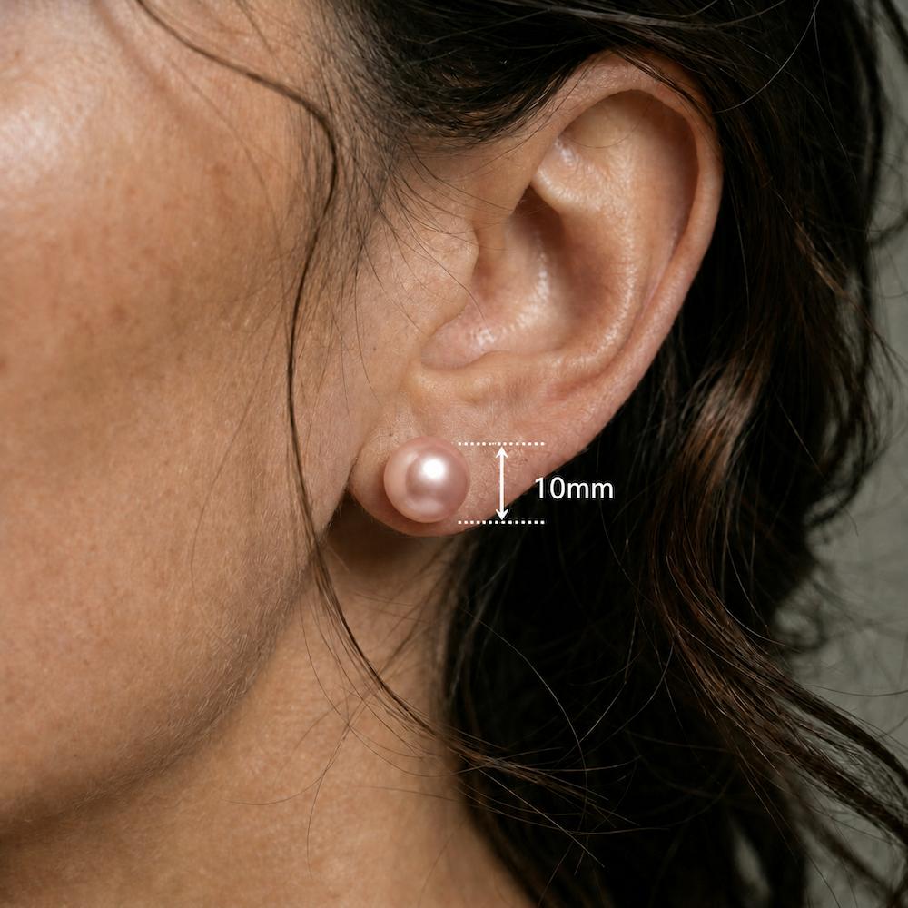 Close ear image showing the matching pink round stud with only a 10mm measurement label.