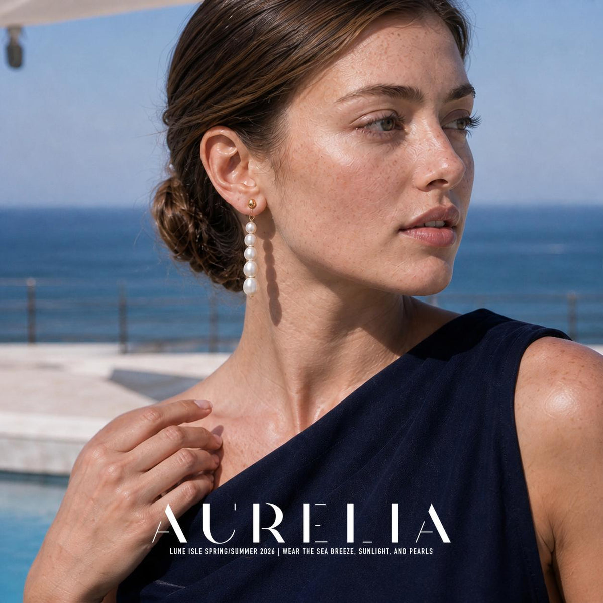 Shoulder-up poolside portrait with five-bead drop earring unobstructed.