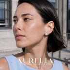 Close portrait from opposite side showing circular halo stud around white bead.
