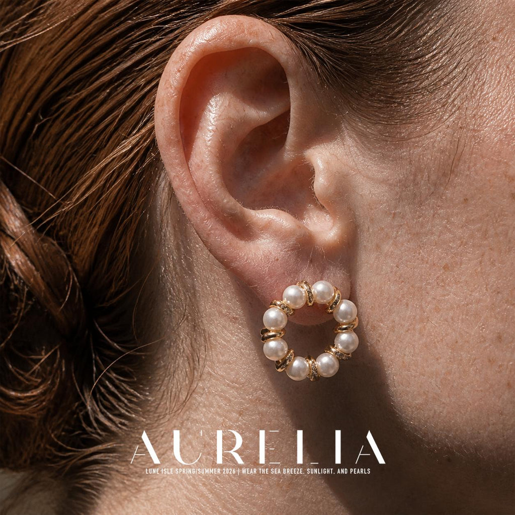 Close ear view showing the eight beads and alternating curved separators.
