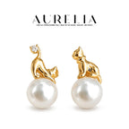 Asymmetric Cat Crystal Pearl Stud Earrings — supplied AURELIA product photograph.