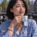Model wearing bracelet while holding a cup. Single row of white round beads with a smooth oval silver-colored clasp; the close clasp view matches the main, and other worn views show the same plain strand. No worn photo is assigned to an exclusive size variant.