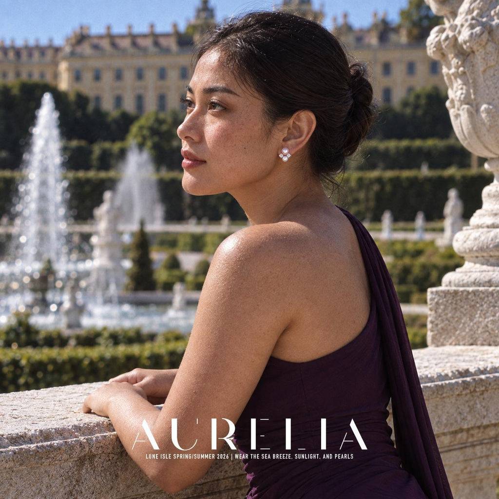 Over-shoulder garden portrait wearing pink top bead, white lower bead and two clear side accents.