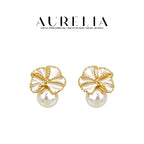 Folded Flower Crystal Pearl Stud Earrings — supplied AURELIA product photograph.